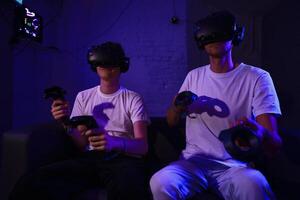 The player plays the game using virtual reality. Neon style. photo