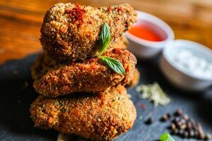 Crispy Fried Chicken Wings on Slate Plate photo