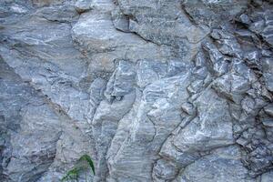 Close-up sharp cliff rock texture background image photo