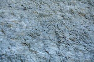 Close-up sharp cliff rock texture background image photo