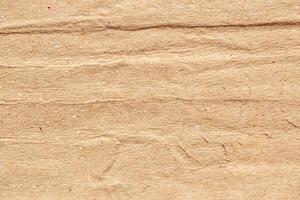 Abstract crumpled and creased recycle brown paper texture background photo