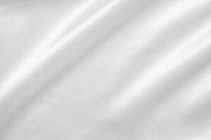 Abstract white fabric with soft wave texture background photo