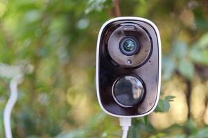 Security IP CCTV camera using solar energy install on the tree for home security system photo