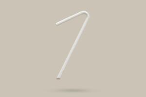 Biodegradable eco friendly white paper drinking straw mockup isolated on gray background photo