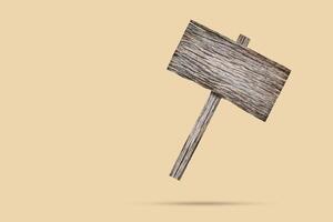 Old wooden sign float on brown background photo