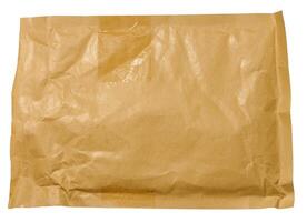 Rectangular envelope made of brown paper on isolated background photo
