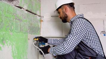 Plumber installs or change water filter in new apartment. Replacement aqua filter video