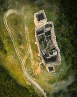 Aerial overhead view The Skhvilo fortress or Skhvilo castle. Medieval fortress in region of Shida Kartli, in Kaspi District, Georgia. 14th century. Served as residence of the duke family Amilakhor photo