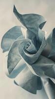 delicate origami design, with intricate folds creating a sense of depth and texture with copyspace photo