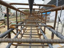 Steel A perspective through the heart of a reinforced concrete structure, revealing the intricate network of rebar awaiting its concrete encasement. photo