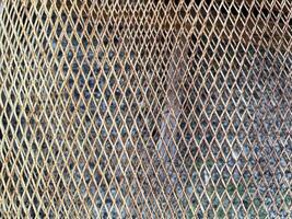 Seamless geometric metallic texture pattern with industrial and grunge elements photo