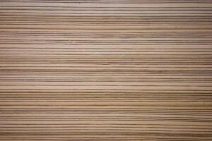 Closeup lines pattern plywood background photo