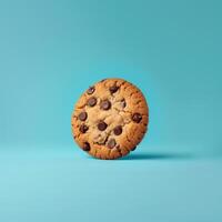 Chocolate chip cookie on a blue background. Perfect for branding, advertising, and social media. photo