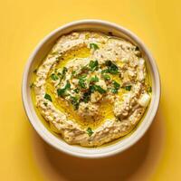 Bowl of Baba Ganoush with Olive Oil and Parsley photo
