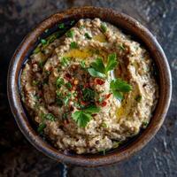 Bowl of Baba Ganoush with Herbs and Spices photo