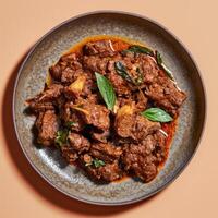 Delicious Lamb Curry with Basil Garnish photo