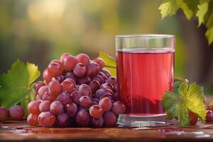 Fresh Grape Juice with Grapes and Leaves photo
