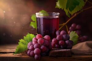 Glass of Grape Juice with Fresh Grapes photo