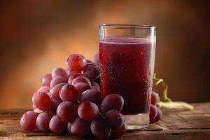 Glass of Grape Juice and Fresh Grapes photo