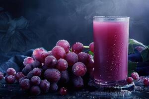 Fresh Grape Juice and Grapes with Water Drops photo