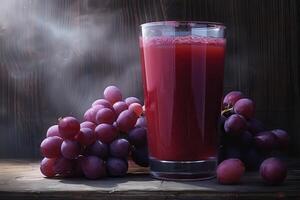Grape Juice and Fresh Grapes on a Rustic Wooden Table photo
