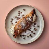 Homemade cream puff pastry filled with whipped cream and chocolate chips. Delicious and sweet dessert for breakfast, brunch, or afternoon tea. photo