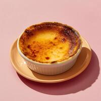 Close up of creamy, golden brown baked cheesecake in a white ramekin. Delicious dessert with caramelized topping. Food photography concept. photo