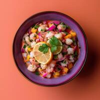 Delicious Peruvian Ceviche with Shrimp, Red Onion, and Mango in a Purple Bowl photo