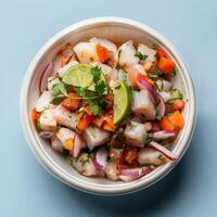 Freshly made Peruvian ceviche with white fish, red onions, lime juice, cilantro, and tomatoes photo
