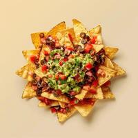 Close-up of delicious nachos with guacamole, tomatoes, and olives, perfect for a party or snack. photo