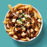 Delicious poutine with cheese curds, gravy, and fries. Classic Canadian comfort food. photo