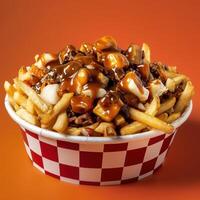 Classic poutine with cheese curds and gravy, Canadian national dish, fast food. photo
