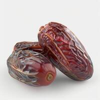 Three fresh dates isolated on a white background. Middle eastern sweet fruit, healthy food, ramadan food. photo