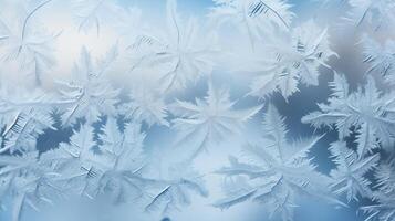 Close-up of frost patterns on winter window photo
