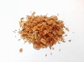 Roasted Onion Isolated, Dry Onion Pieces, Bulb Chips, Deep Fried Vegetable, Caramelized Shallot Sprinkles, Crispy Fried Onions on White Background photo