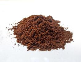 Ground Coffee isolated on white background photo