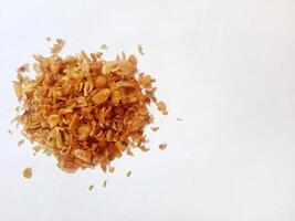 Roasted Onion Isolated, Dry Onion Pieces, Bulb Chips, Deep Fried Vegetable, Caramelized Shallot Sprinkles, Crispy Fried Onions on White Background photo