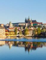 View of Charles bridge over Vltava river and Gradchany photo