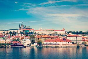 View of Charles bridge over Vltava river and Gradchany photo
