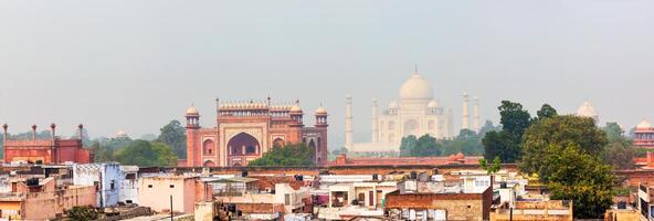 Panorama of Taj Mahal view over roofs of Agra photo