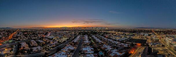 Aerial panoramic view of the illuminated skyline of Las Vegas at night photo