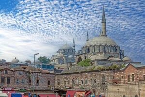 Panoramic picture of the Rustem Pasha Mosque in Istanbul with a deserted forecourt photo