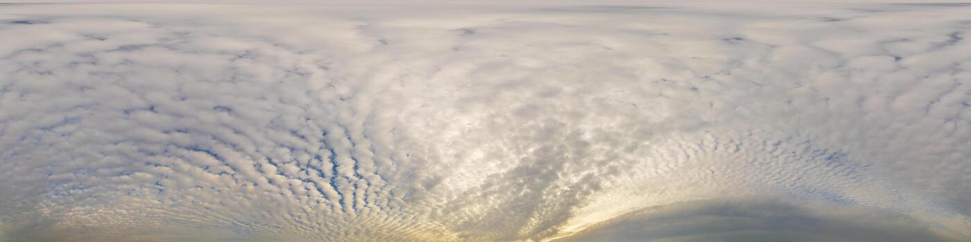 Overcast sky panorama on rainy day with Stratocumulus clouds in seamless spherical equirectangular format. Full zenith for use in 3D graphics, game and for aerial drone 360 degree panorama as sky dome photo