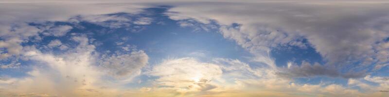 Dark blue sunset sky panorama with golden Cumulus clouds. Seamless hdr 360 panorama in spherical equirectangular format. Full zenith for 3D visualization, sky replacement for aerial drone panoramas. photo