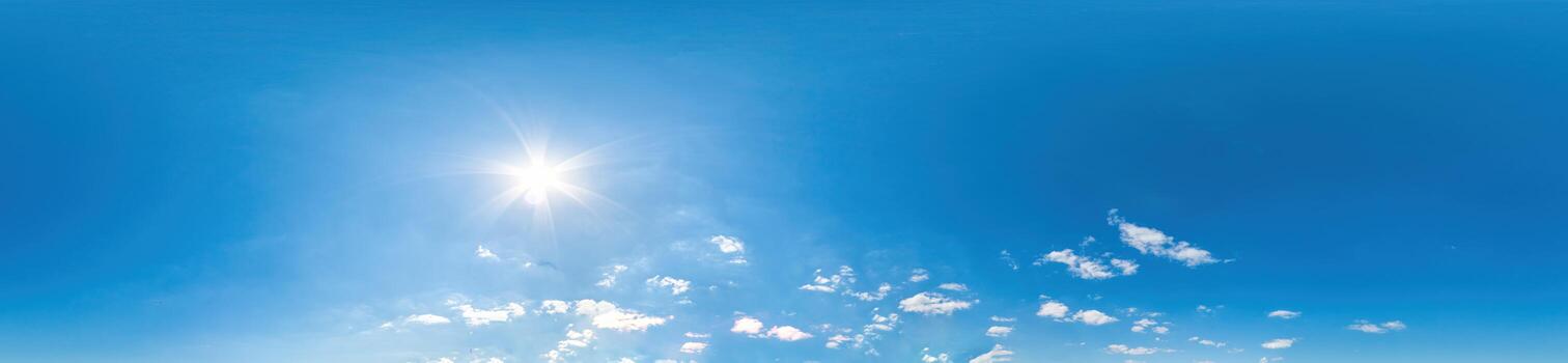 Blue sky with light clouds Seamless panorama in spherical equirectangular format with complete zenith for use in 3D graphics, game and for composites in aerial drone 360 degree panoramas as a sky dome photo