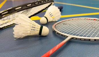 Racket and Shuttlecock with use sport or exercise on a black background. photo