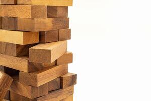 Table game made of wooden blocks isolated on white background photo