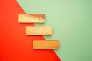 Blank three wooden blocks on colorful background with space for text photo