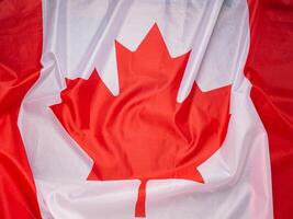 Full frame of the Canada flag. Top view. Flat lay. Space for text photo