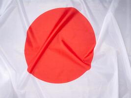 Full frame of the Japanese flag. Top view. Flat lay. Close-up photo